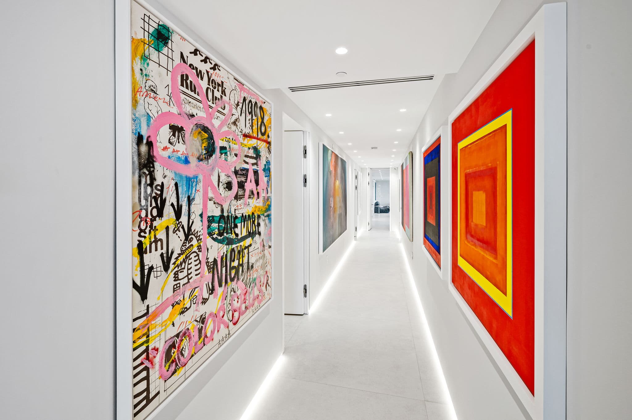 Gourmet kitchen with Miele appliances and waterfall countertop island